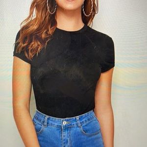 Sketchy black top, from “caution to the wind”